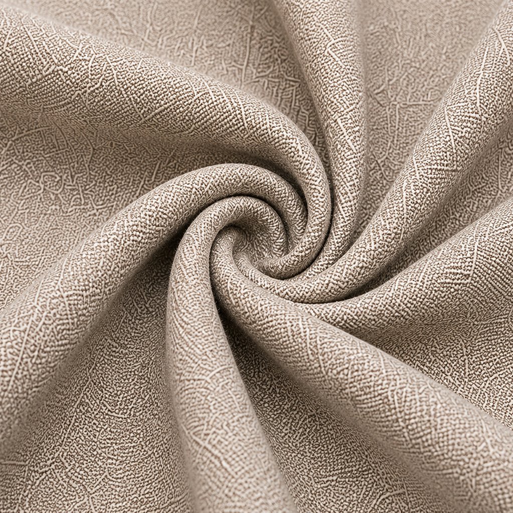 Close-up swirl of beige fabric weave